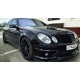Предна тунинг броня за  Mercedes W211 E-Class (2002-2009) - AMG с черна решетка и халогени